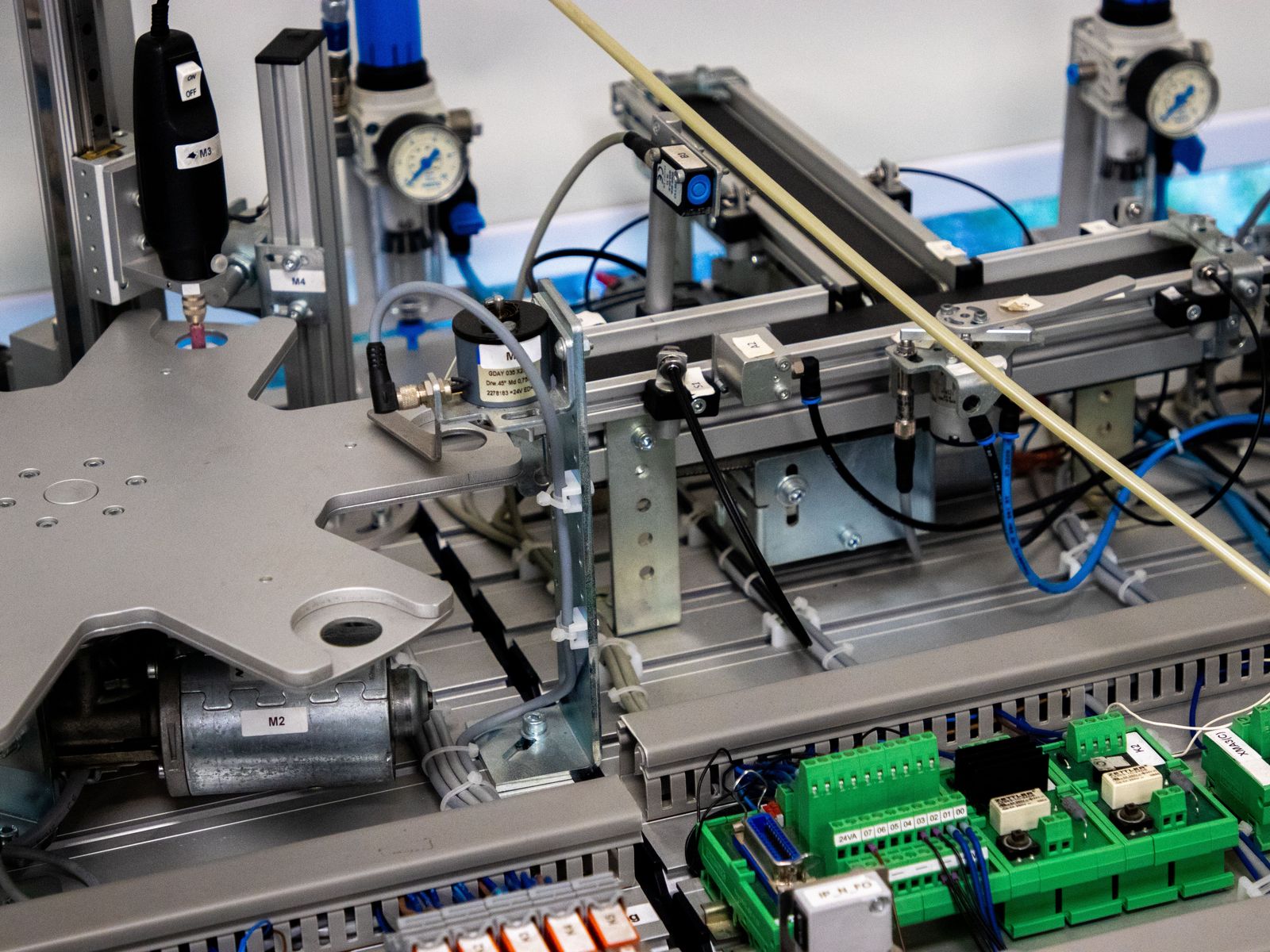 Pneumatic test fixture with gauges, sensors and I/O modules.