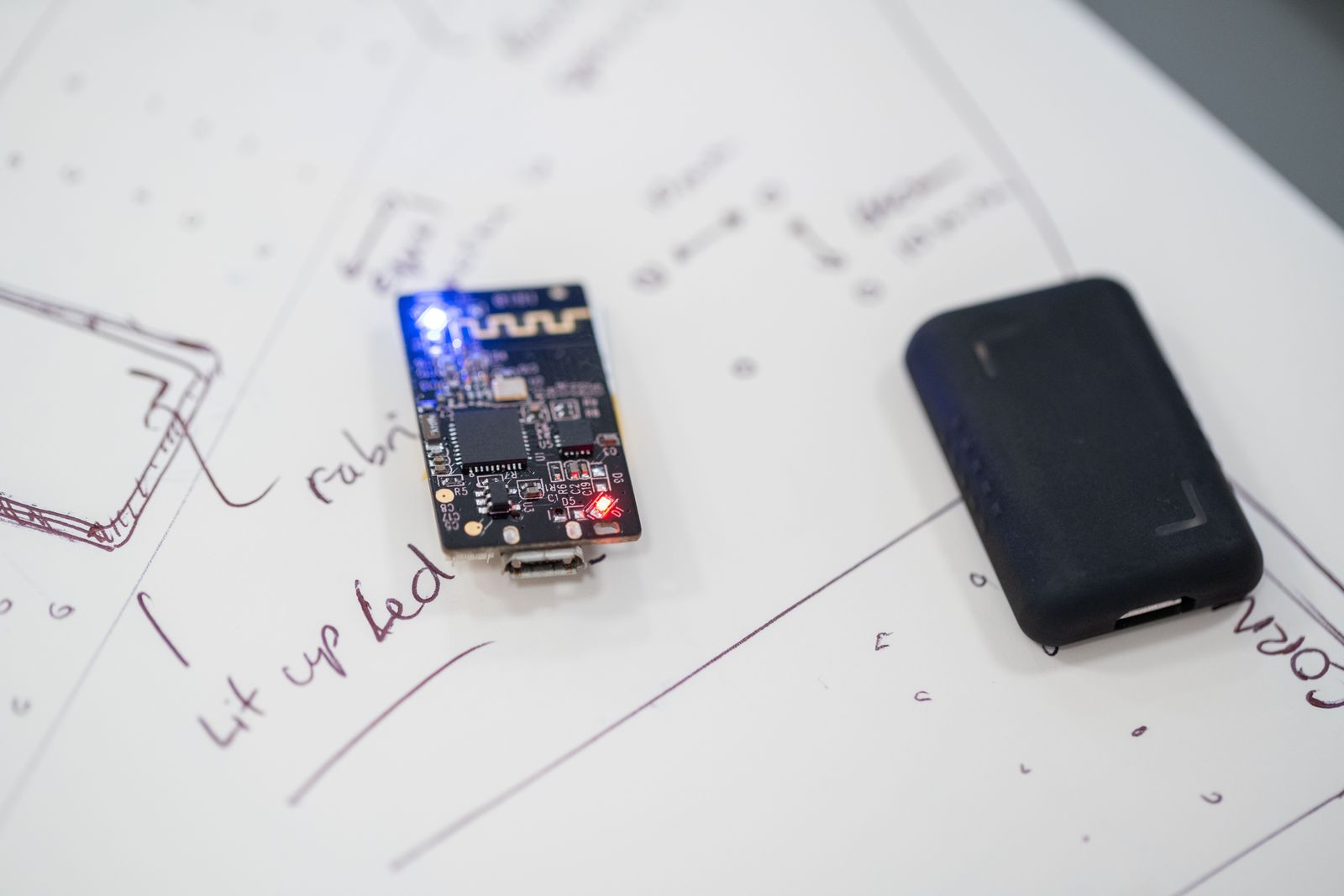 Prototype electronics on technical sketches before launch.